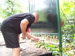 2010-Aug-5th_19_helping-hand-wire-brushing-frame-after-board-repainted